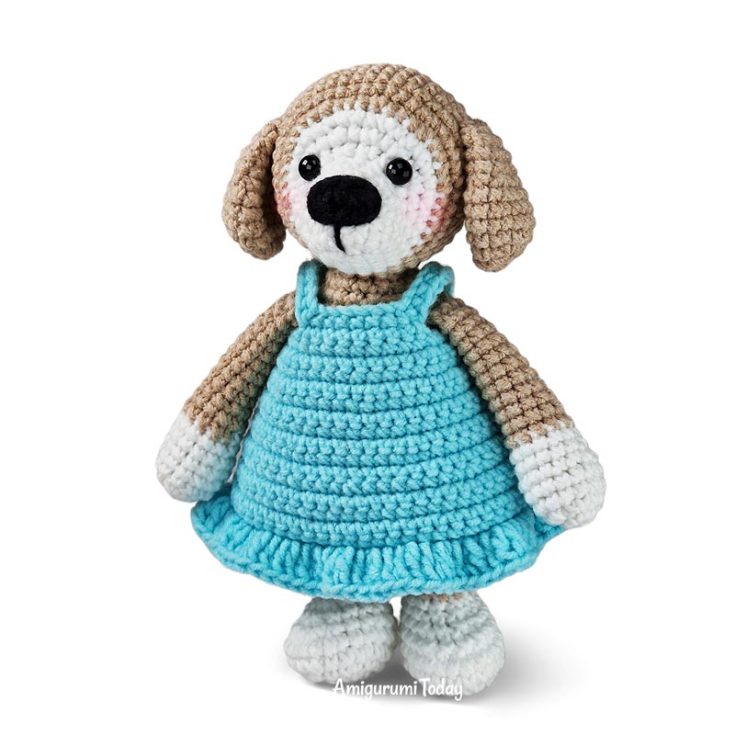 If you need a study buddy, cuddle companion, or playtime partner, this puppy crochet pattern is the one for you! Learn how to make her cute little standing body and dress by signing up to view this free pattern.
