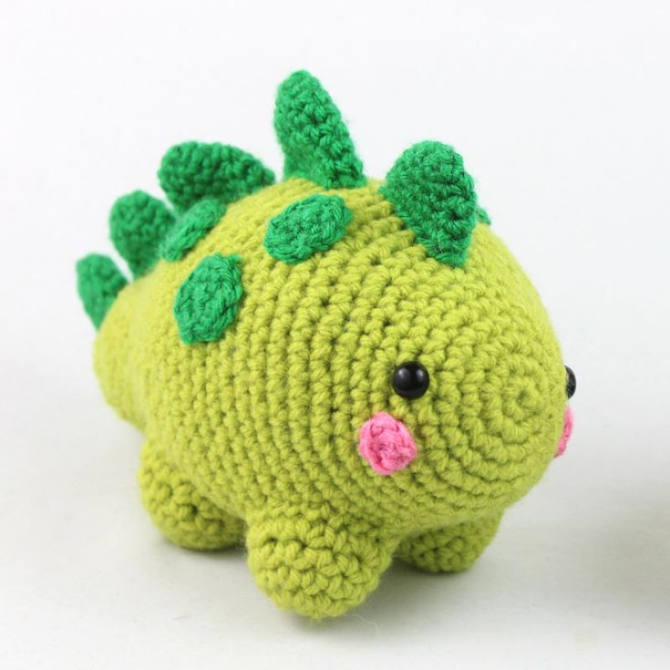 Rounded and squishy like stress balls, this colorful dino crochet pattern has spikes over its back and short stubby legs. Make them in classic dino green, or go wild with your colors!
