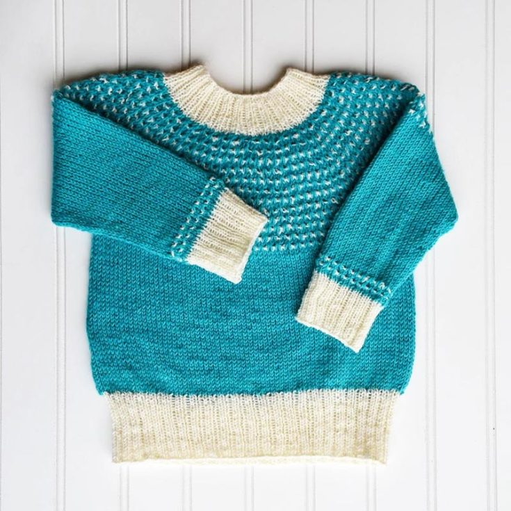 Shower your little ones with love with this super cozy and versatile Drizzle Sweater. Made with contrasting shades and basic knitting techniques like the slip stitch, this pattern is reminiscent of gentle raindrops falling on a lazy afternoon. It&rsquo;s an easy pattern that all knitters should try, and it&rsquo;s ideal for your little ones to wear when you lounge at home. The finished size fits kids ages 12-18 months and 2-4 year olds.