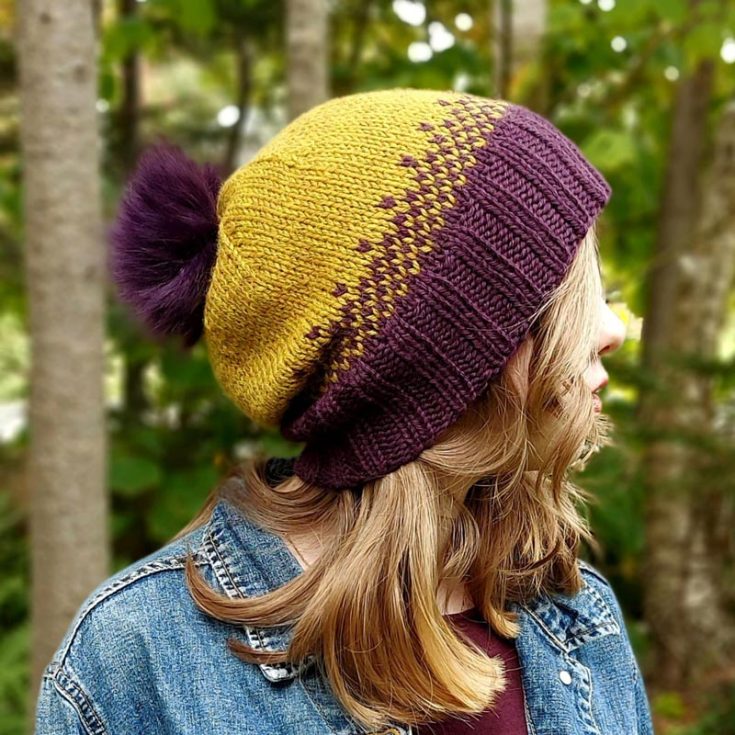 Reminiscent of a stroll through a pumpkin patch during the golden hours, this fall harvest beanie is gorgeous and fashionable. While it's made with a simple design and a pompom on top, this hat utilizes the complimentary colors of earthy yellow and eggplant purple. The finished knitted hat is around 22&rdquo; in circumference and 10&rdquo; in length.