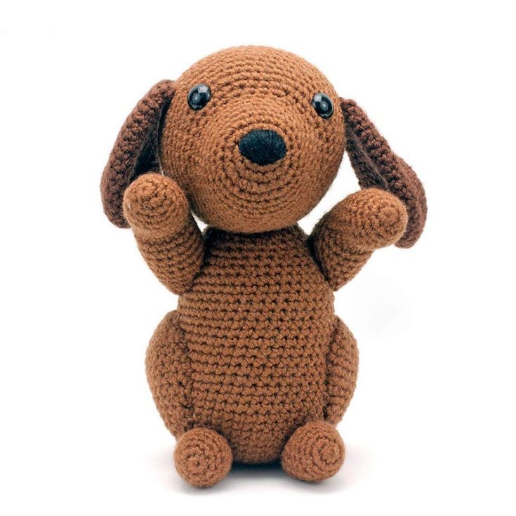 Henley, the hound, is a sweet and playful pup looking for a new owner! Learn to make this cute hound crochet pattern that is suitable for intermediate crocheters or adventurous beginners. He is 8.5" tall and 4.5" wide.