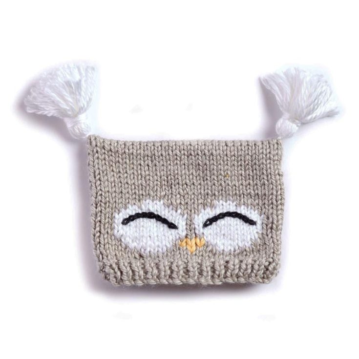 Want a hoot-worthy accessory for a baby? This knitted owl hat will ignite smiles and keep your baby warm wherever you go! While this is an intermediate project, you only need a little patience. The finished hat will fit baby head sizes from 6 to 12 or 18 to 24 months old.