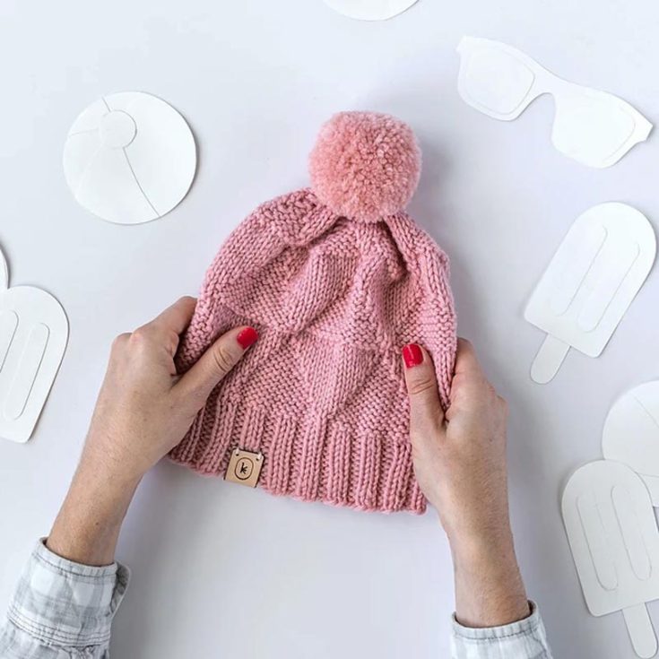 Wrap yourself in the cozy embrace of this July hat pattern! Using only worsted-weight yarn, this charming design exudes warmth and style with every stitch. On top of that, it&rsquo;s a relaxing project to make with a hot cup of cocoa over the fireplace. The finished sizing is 18.5&rdquo; x 8.75&rdquo;.