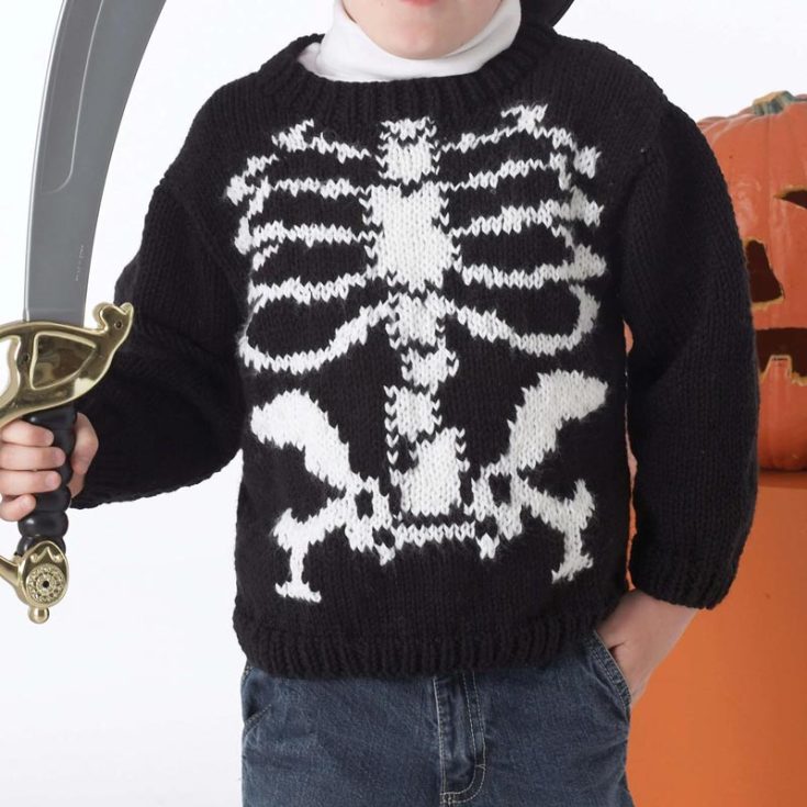 Get into the holiday spirit with this Halloween-themed knit sweater you can make for your little ones. This spooky-chic sweater features an eye-catching skeleton motif that adds a cute touch to your kid&rsquo;s wardrobe. With its simple construction and easy-to-follow pattern, this intermediate project promises comfort and style. The finished sizes are 21&rdquo;, 23&rdquo;, 25&rdquo;, and 26 &frac12;&rdquo;.