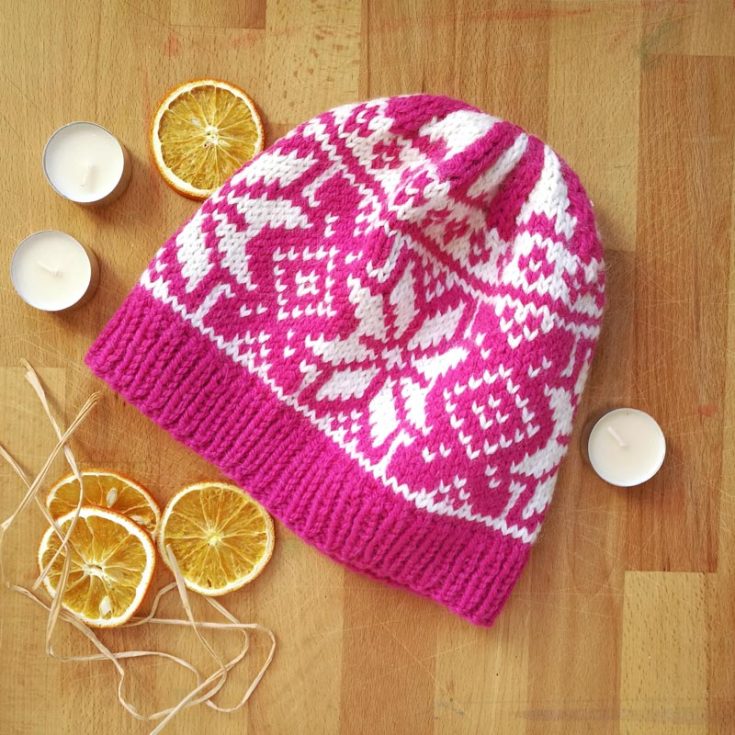 Check out this magenta-pink rose beanie pattern! It&rsquo;s a must-have addition to your Winter apparel and an intermediate-level project. It incorporates Aran weight yarn for the tight stitches to make this lovely pattern snug on your head. The size for an adult head circumference is 22&rdquo;-25&rdquo;.