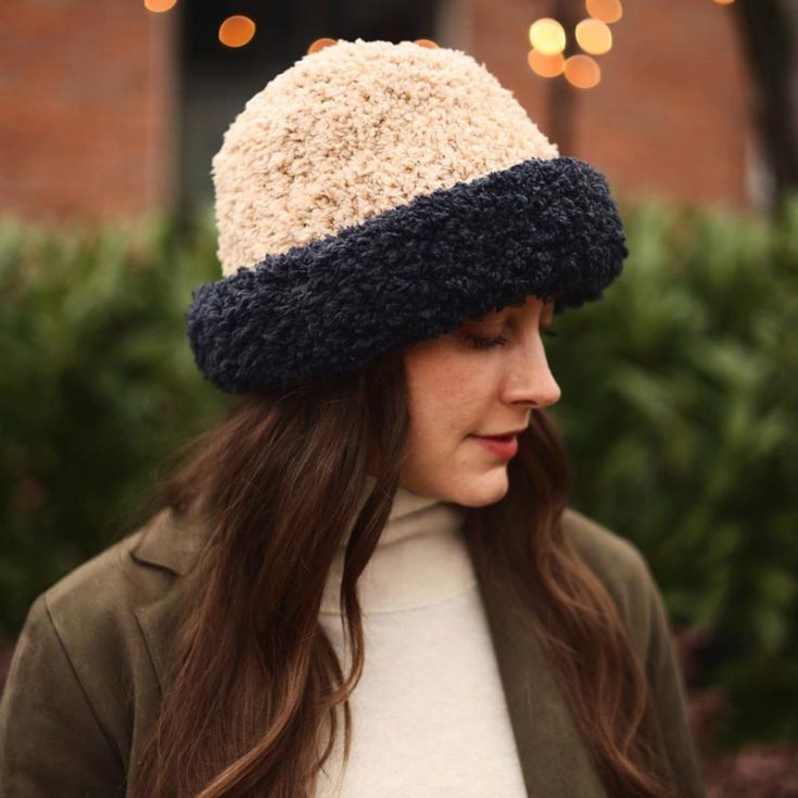 This design is a real showstopper that will make heads turn your way! Doesn&rsquo;t it look so elegant? Not only will you be kept warm all winter, but it&rsquo;s a fashionable piece that&rsquo;s a staple in your closet. All you need is one skein for each color, some basic stitches like the knit stitch, and you&rsquo;ve got yourself a beautiful teddy bucket hat. The finished size in circumference is 12 (16, 20, 24)&rdquo; and 4.5 (5.5, 6.5, 7.25)&rdquo; for the crown height.