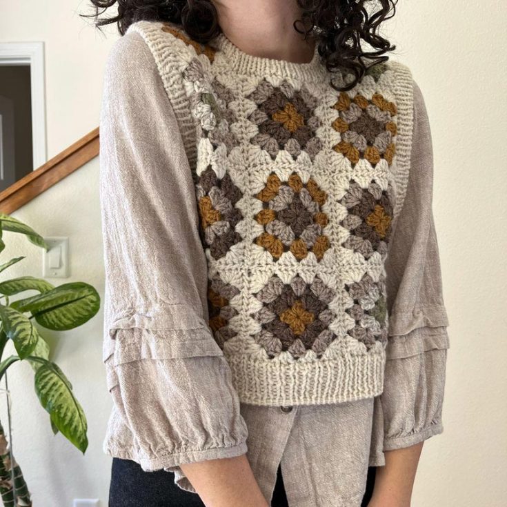 Have a look at this simple vest that is made of granny squares and leftover yarn! Though the granny squares are crocheted, the armholes, hem, and collar are knitted. However, you can also choose to crochet the whole top. It comes in adjustable sizing.