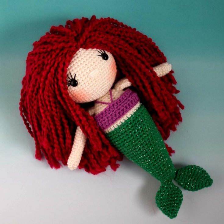 Have you ever had those moments of being mesmerized by tales of mermaids and sirens living amongst us? Maybe they do, but we don't know it. Well, here's your chance to create a doll representing your curiosity and imagination of the existence of these lovely sea creatures. She is under 12" tall and 4.5" wide.