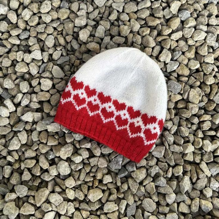 Knit a comfy hat adorned with cute hearts for Valentine&rsquo;s Day! This pattern is worked in rounds from the bottom up and made with sport-weight yarn. Here&rsquo;s a fun suggestion: since the sizes are available for toddlers to adults, why not knit a matching pair with your little ones? Adult sizes come in S, M, and L.