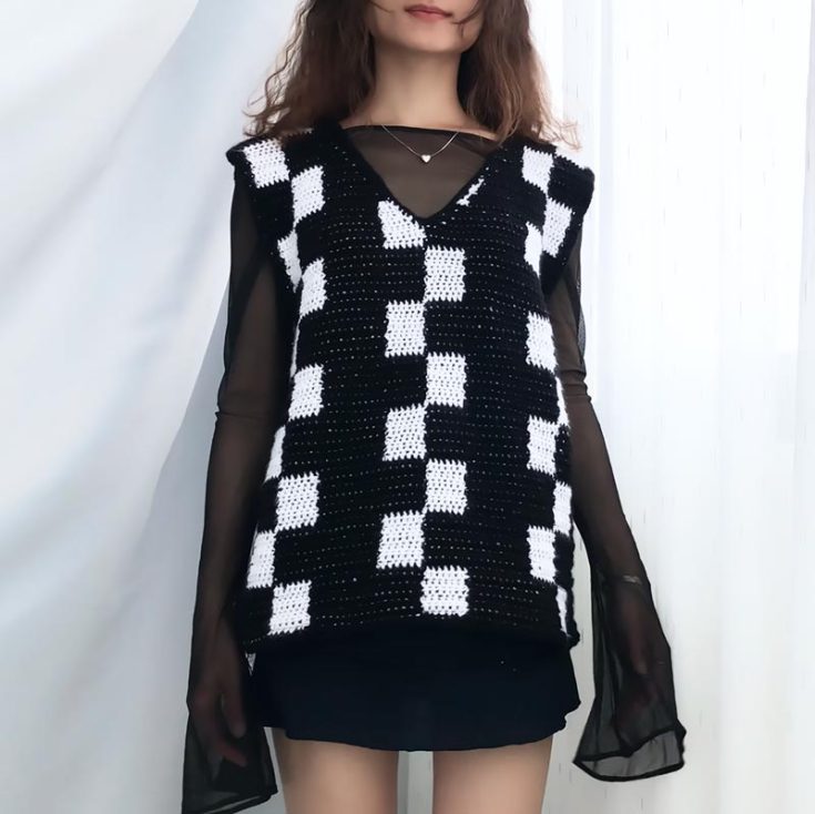 Check out this fantastic vest replica that Wednesday Adam wore! Similar to the checkered vest pattern, this design offers a few color options, such as pink and brown, to match Wednesday's bestie, Enid. It comes in sizes S-XL.