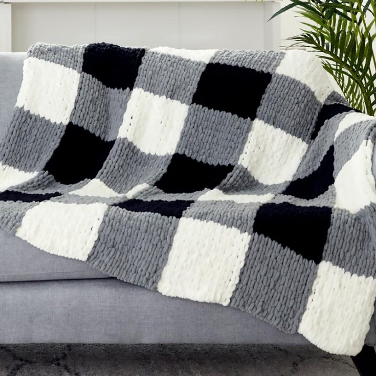 If you&rsquo;re searching for classic and beginner-friendly knit blanket patterns, then this Checked Blanket will win! It&rsquo;s stylish and chic and matches pretty much any home decor aesthetic! It&rsquo;s a comforting blanket that uses the innovative loop technique for finger knitting and works well as a decorative or functional piece! The finished size of this lovely blanket is precisely 132cm.