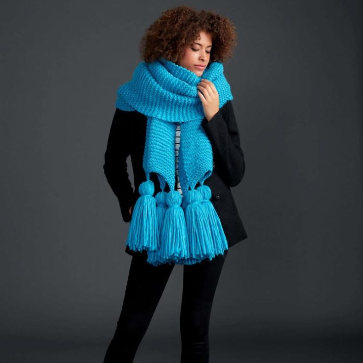 Here&rsquo;s another thick scarf that is super cozy to wear! It&rsquo;s plush, oversized, and offers your wardrobe a fun pop of color! Not to mention, it&rsquo;s stylish to pair with any article of clothing, too! It&rsquo;s beginner-friendly, which makes it a quick project to complete. Try it out now!