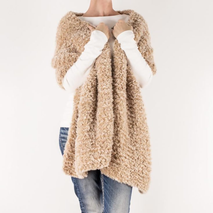 This thick scarf promises comfort and warmth all Winter long! And it&rsquo;s incredibly soft on the skin, too! You&rsquo;ll learn how to create this beginner-friendly project by following the easy instructions that will guide you in knitting this scarf using several techniques. You&rsquo;ll be knitting it flat back and forth, making knit stitches, and adding a clean edge.