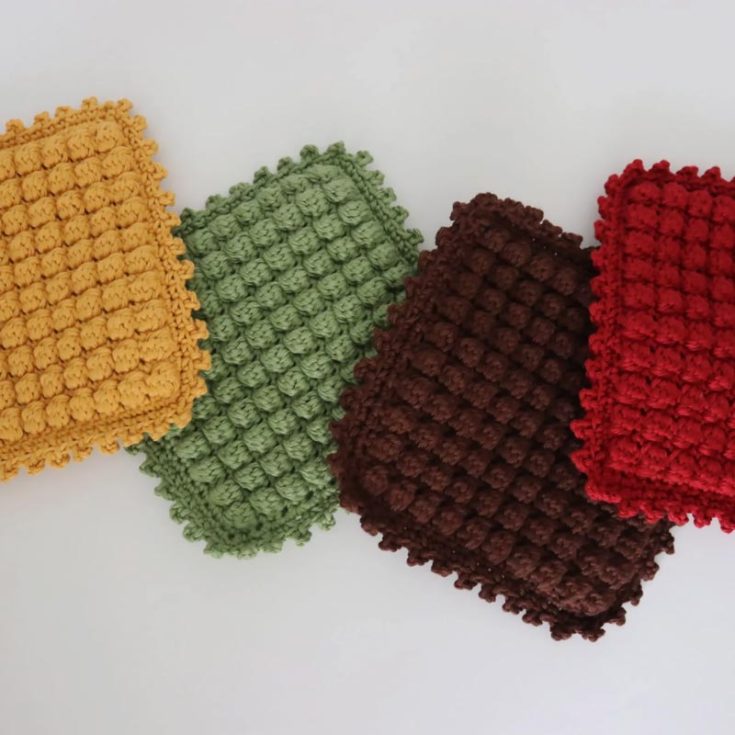 Create some cute bobble stitch hot pads to use in your kitchen! They feature the bobble and picot stitch, which is pretty simple for advanced beginners. There is even a YouTube tutorial for you to follow along to make an 8" x 8" hot pad.