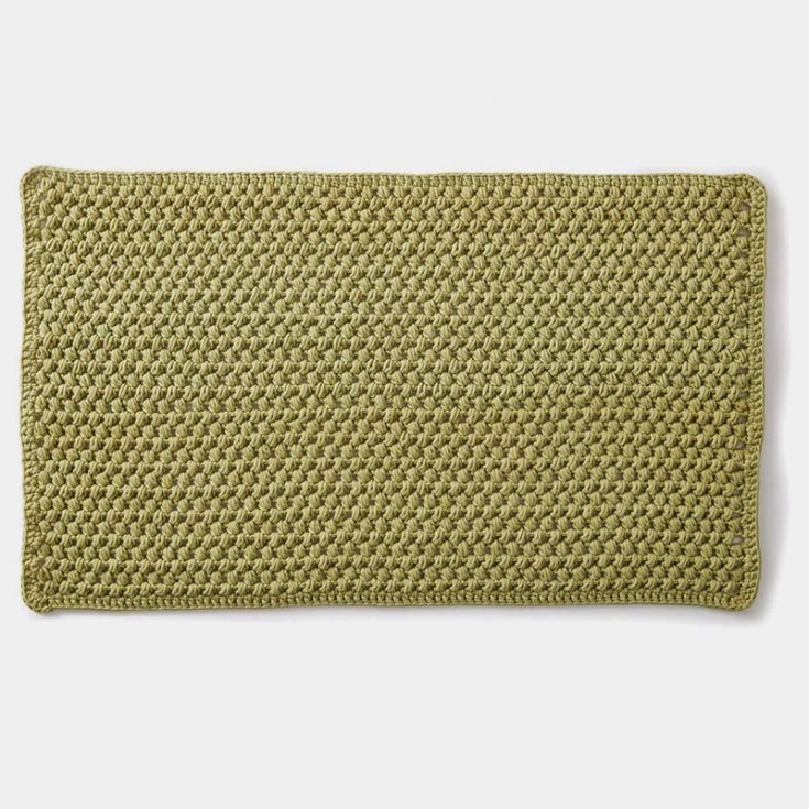Here is a classic beginner's bubble bathmat crochet pattern. It's simple, minimalist, and it's timeless. You'll also get to practice your bubble stitch while making this mat for your bathroom.