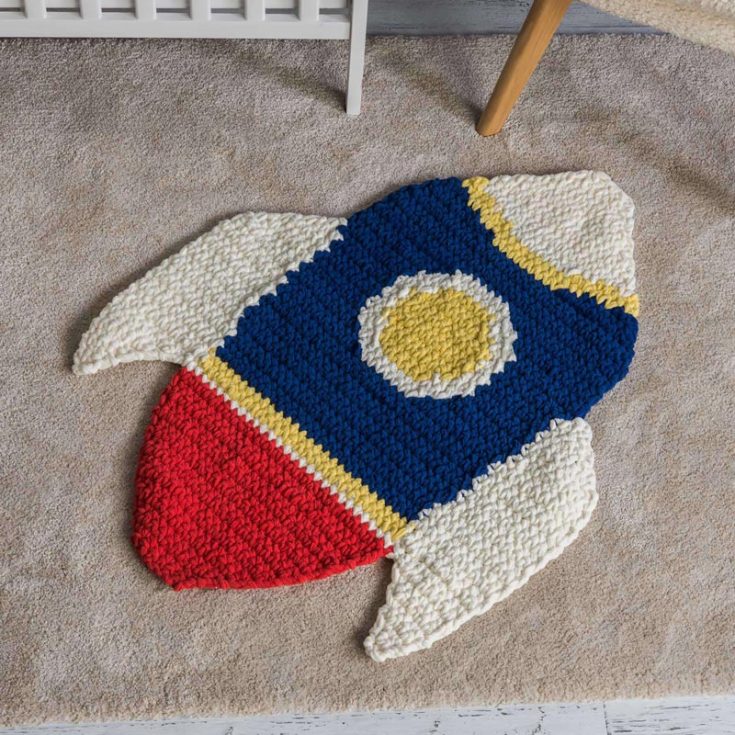 This is another fun nursery or children's room rug. A rocket! Use bright colors to make the mat pop! This is an easy, beginner-friendly pattern.