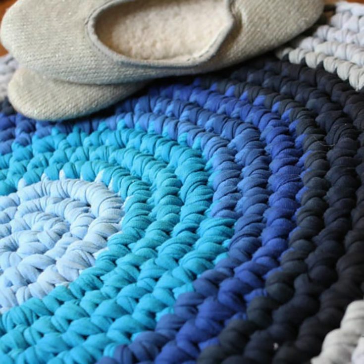 Create your crochet rug from repurposed T-shirts! A great way to be environmentally conscious in your own home. This pattern may take some time as you'll have to make your own yarn from the shirts.
