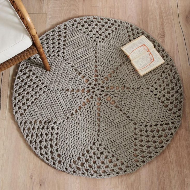 Worked in the round, this rug is made of 4 strands of yarn held together. Play with fun colors or a classy monochromatic look as you practice your double crochet, chain, and increase techniques.