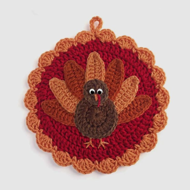 Gobble gobble! Isn't this turkey pot holder just adorable? This beginner potholder design would make an excellent Thanksgiving gift for your friends and family. Though it's meant for decoration since it's made with acrylic yarn, you can always opt for cotton yarn to make it a functional potholder in your kitchen. The finished size is 8.5" across.