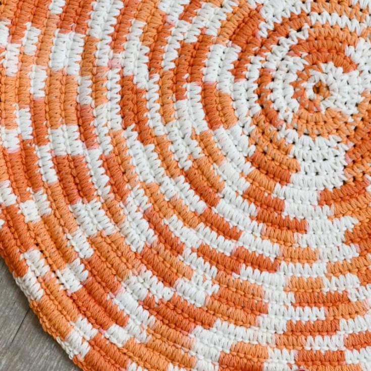 Stash buster and scrap yarn time! This tutorial guides you in-depth on crocheting a scrap yarn rope bath mat. If you're comfortable with single crochet stitches, you should have no issues with this mat.