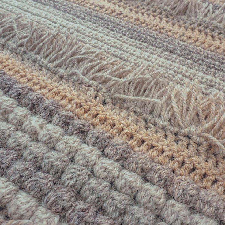 Up for a challenge?&nbsp;Give this textured rug crochet pattern a go! It's made using the single, double, and bobble stitch. There is also fringe detailing and decorative tassels&nbsp;for even more texture.