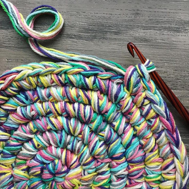 Introducing another fun stash buster pattern, this scrappy rug is made with eight strands of worsted-weight yarn held together. So expect the ultimate plush and thickness from this rug!