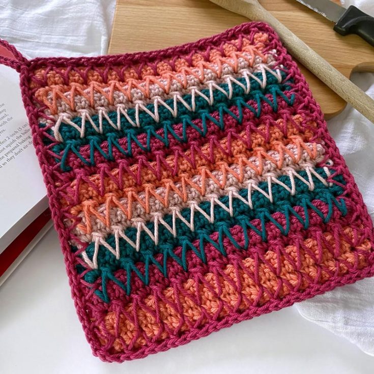 Doesn't this crochet potholder remind you of the subtle transition from summer to fall? It's a unique potholder pattern, and the colors perfectly blend warm days and cool evenings. Ideal for intermediate crocheters, and the finished potholder size is 8" x 8".
