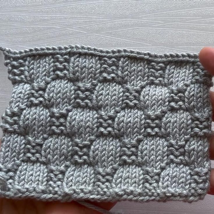Speaking of 12-row repeat knitting stitches, the Alternating Bubble Stitch is worked up fairly quickly, and it&rsquo;s an easy project for beginners to try. Like many knit patterns, it&rsquo;s only constructed with the knit and purls.