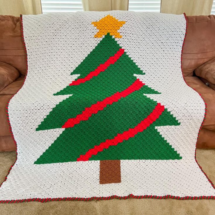 To make this Christmas Tree blanket that will keep you warm for the chilly season, you will need to know how to do the C2C crochet technique. This intermediate-level blanket is approximately 72" x 56" with a lovely festive candy cane border.