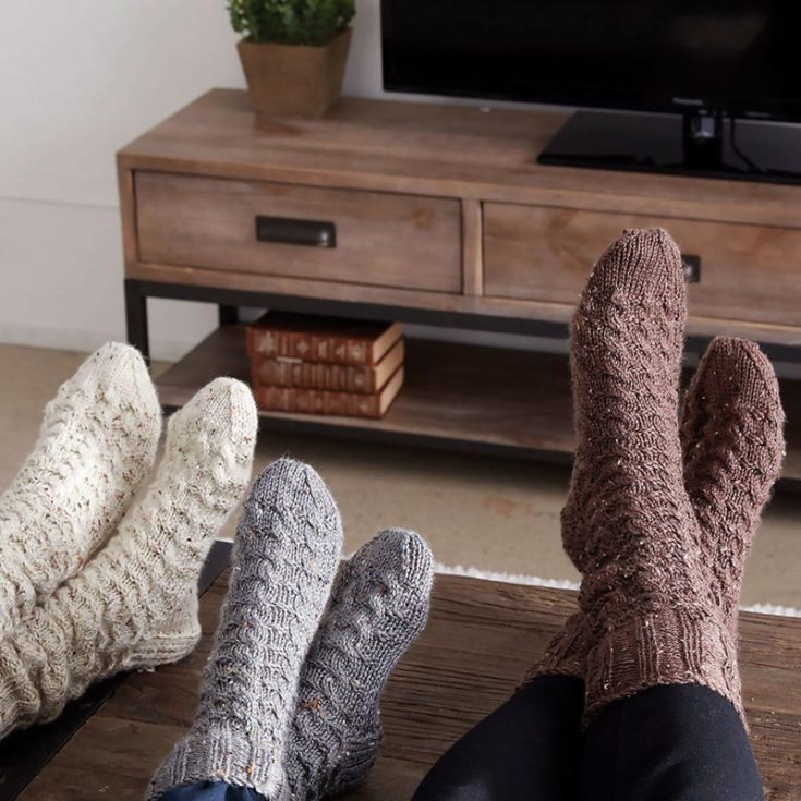 Here's another intermediate pattern that is to die for! It's simple, yet it looks so cozy and rustic. These socks are perfect for cuddling up by the fireplace with the family during a cold, chilly night. This design comes with video and written instructions on how to knit these socks for your family, starting with sizes for children ages four and above.