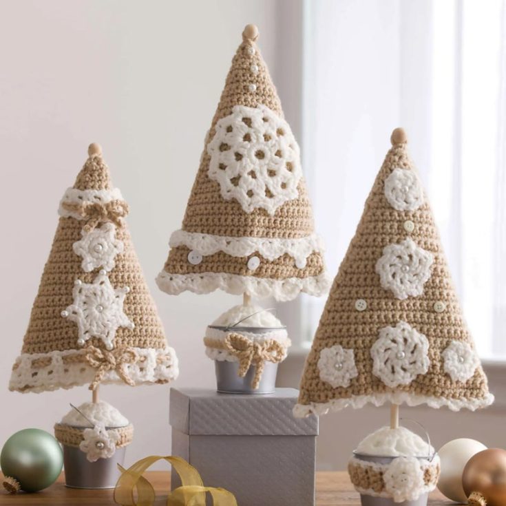 For those of you who prefer a minimalist, clean girl aesthetic, these neutral-tone trees are exactly what you need for a white Christmas. They're fairly easy to make, and they measure 7&frac34;" wide x 10&frac12;" tall without the bucket and 16" tall with the bucket.