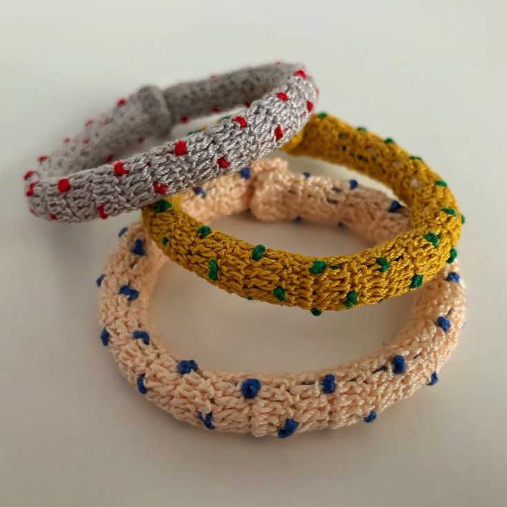 Inspired by polka dots, this thick cord-like crochet bracelet bangle is a fun addition to your accessories collection! It's easy to make and looks super classy on your wrists.