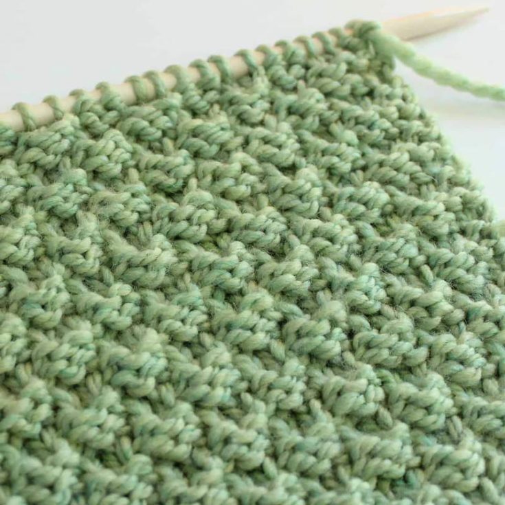 The Double Moss stitch is a variant of the Moss stitch stitching design. Also known as the Double Seed, Double Irish Moss, Two Stitch Check, and Box Stitch, this pattern is a 4-row repeat design, lays flat, and is reversible.