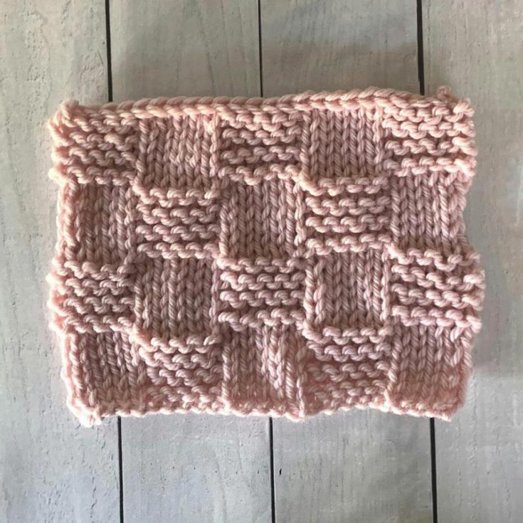 The Garter Checkerboard Stitch is such a stunning yet simple knit pattern. It&rsquo;s a 14-row repeat, and it&rsquo;s relatively easy to make. It&rsquo;s made of knit and purls, and it&rsquo;s a reversible and stretchy design.