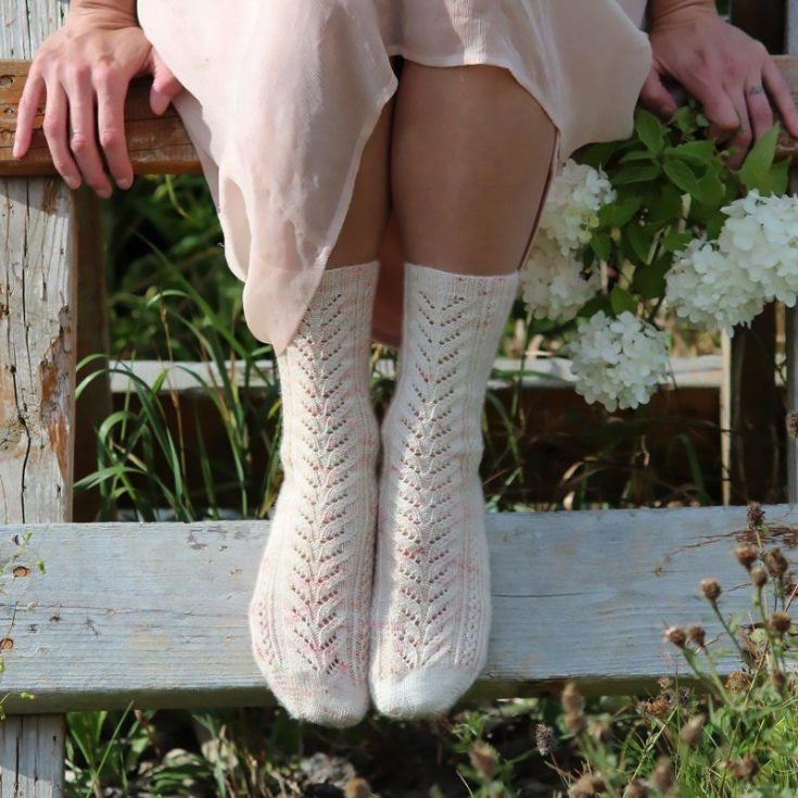 This easy-knit project is a must-have in every girly girl's closet! The delicate color of Cherry Blossoms inspires it, and it features a lovely lace design and keeps the toe and heel a simple and classic look. The instructions come with sizes for S, M, L, and XL.&nbsp;