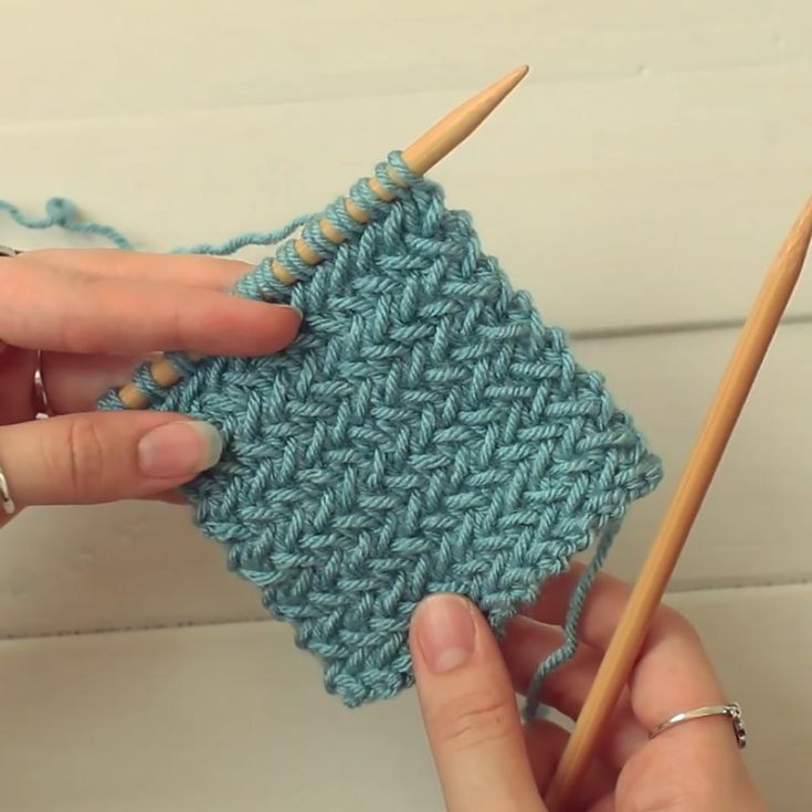 Here&rsquo;s another 2-row repeat pattern that is called the Herringbone Stitch. It creates a stunning, textured pattern that is made through casting on multiples of two stitches, worked over in two rows, and repeated over the entire project.