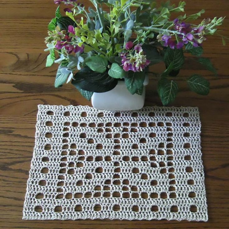Straying away from the classic circular shape is this filet crochet leaf doily project that would make a stunning centerpiece, especially if you prefer an intricate design that fits any home decor.