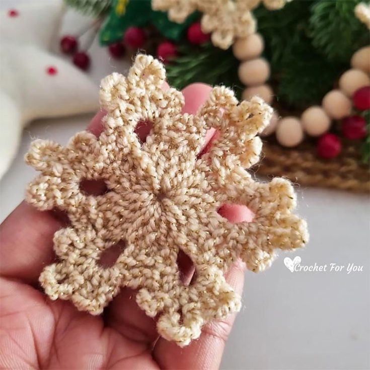 Named the 5-minute snowflake, this crochet piece is a simple project that can be made within 5 minutes (depending on skill and speed of crocheting). it is perfect for an easy quick Christmas present topper or if you need a last minute garland.