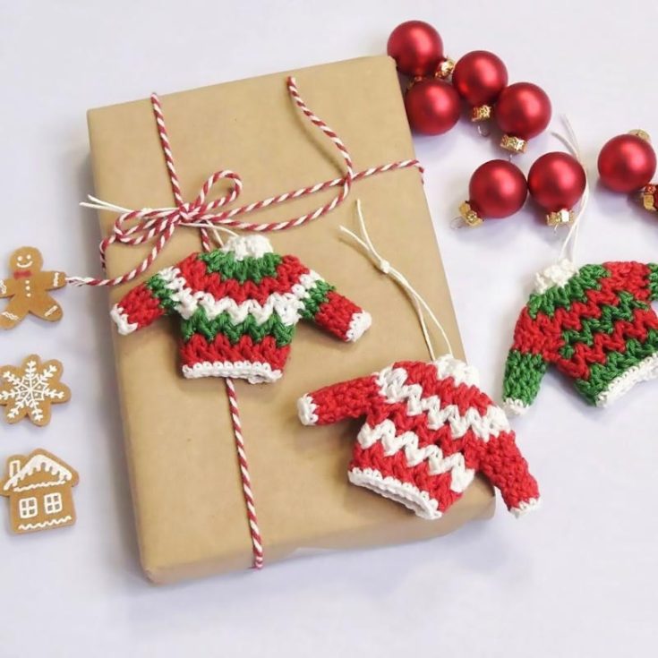 The ugly Christmas sweater is such a classic Christmas tradition. What better way to exemplify that than on a tree as an ornament? Wear traditional Christmas colors or make them bright and clashing for an &ldquo;ugly&rdquo; look.