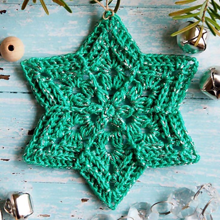With a flower in the center, spreading out with intricate details to form a sharp, crisp star --- this snowflake crochet pattern is sure to be a crowd-pleaser!