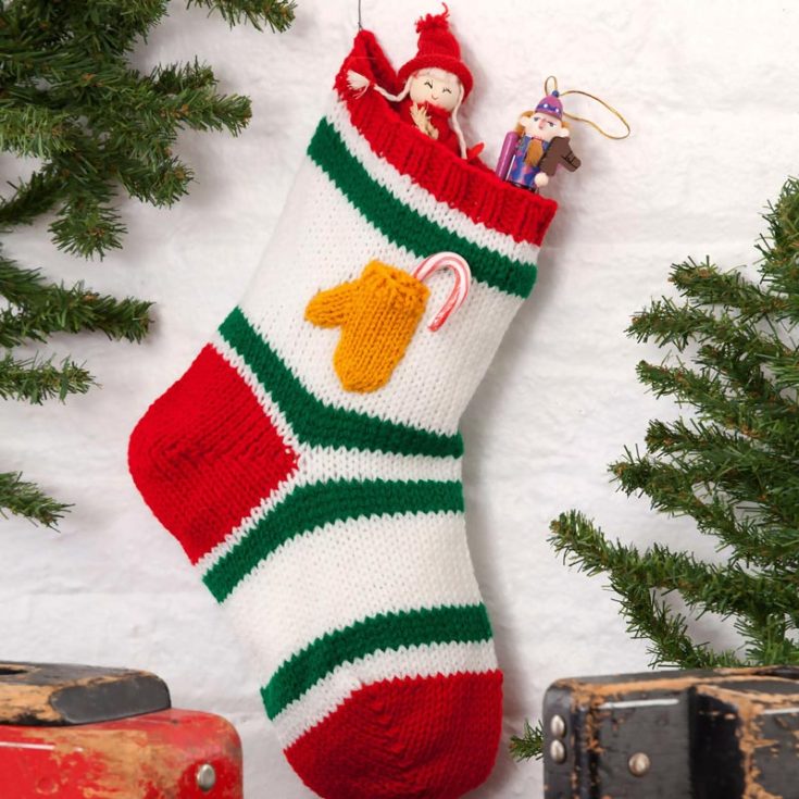 If you&rsquo;re looking for more intricate but simple, unconventional designs, try this one! It features a cute mitten pocket for an extra treat for Santa, and it&rsquo;s an intermediate-level knit project.