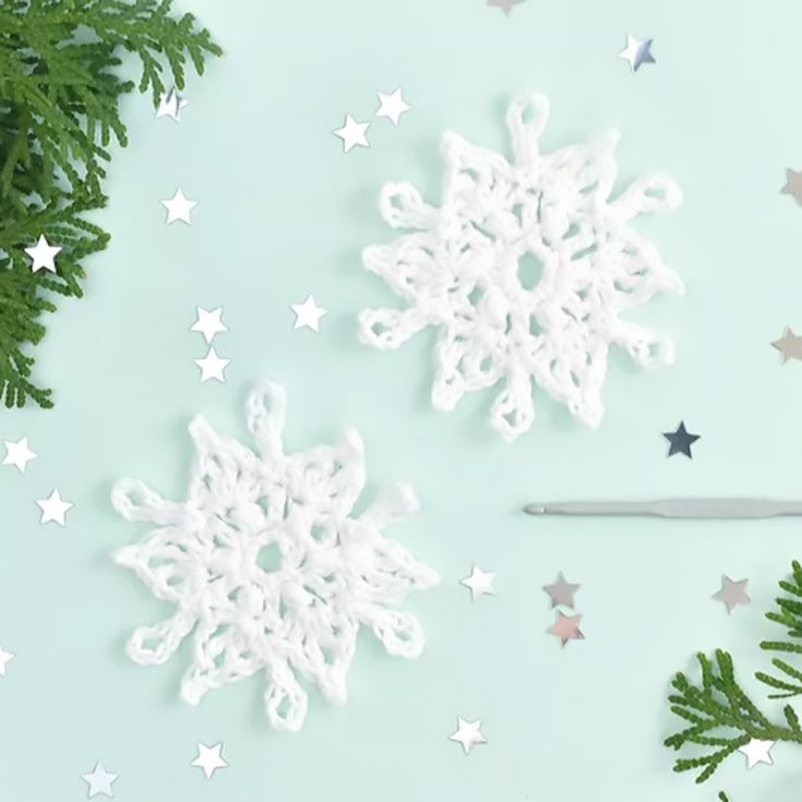 This easy snowflake can be made with a few basic crochet stitches, with the possible exception of the treble or tripe stitch. With only three rounds to crochet, the snowflake comes together quickly.