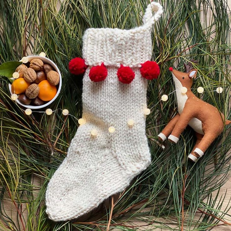 Love adding pom-poms to your stockings? Then this pattern is definitely one you should go for! Its beginner-friendly design makes it a quick-knit project with super bulky yarn. The finished size is 12.5&rdquo; in height and 6.5&rdquo; in width.