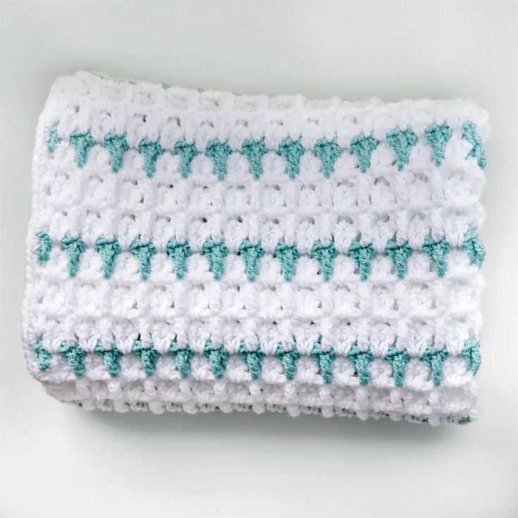 Looking for something more minimalist? This two-color blanket is a simple yet wonderful way to mix and match colors to personalize a blanket. This is a beginner-friendly pattern.