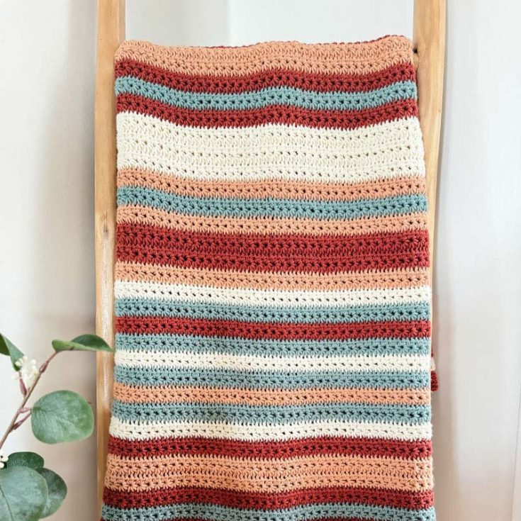 Learn how to make this Star Stitch striped blanket with this intermediate-level pattern! It includes a written guide, a video tutorial, and a handy color chart to make your project a breeze.