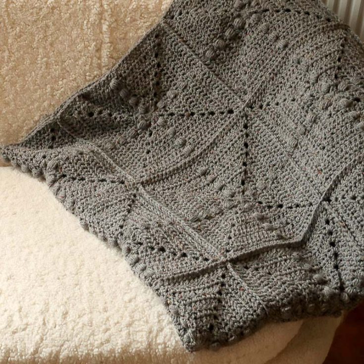 Made with beginner-friendly crochet squares, this blanket is perfect for avid beginners! Instead of seaming, the squares are crocheted together, creating a faster assembly and a beautifully textured finish.