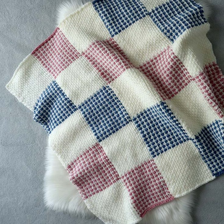 The Modwen Baby Blanket is a beautiful Tunisian crochet baby blanket item that would make a fantastic gift. This is an intermediate-level pattern as you'll need to master the Tunisian crochet technique and stitches.