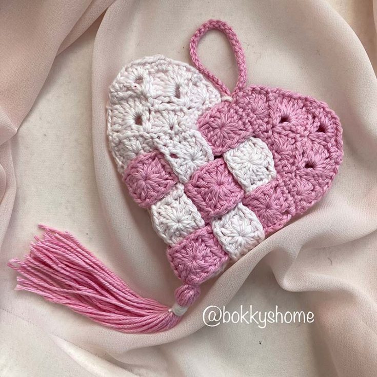 Inspired by Swedish paper hearts, this pattern combines two crocheted pieces for a cool woven effect. It can be used as a decoration, potpourri holder, or a unique gift wrap. Enjoy the pattern!